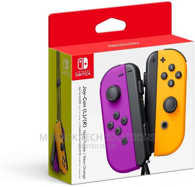 Nintendo Neon Purple/ Neon Orange Joy-Con (L-R) - Switch · Photo 3