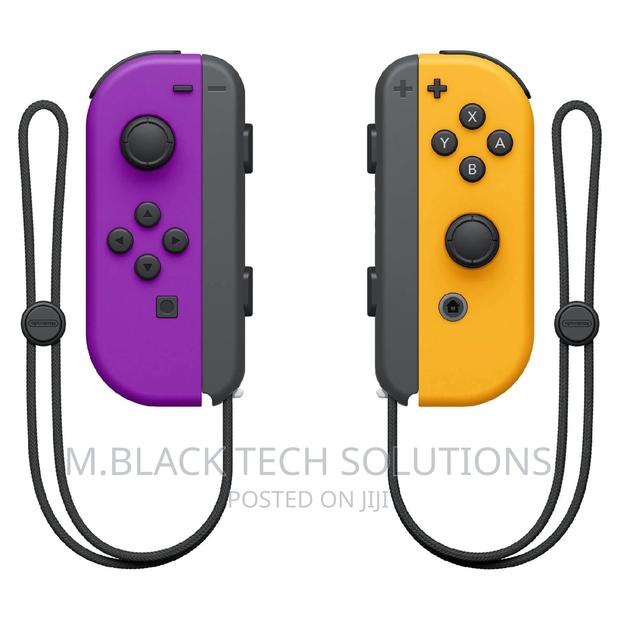 Nintendo Neon Purple/ Neon Orange Joy-Con (L-R) - Switch · Photo 4
