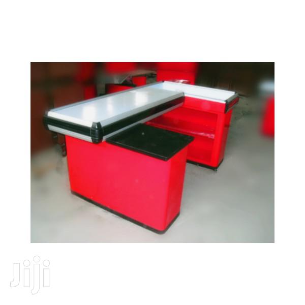 Supermarket Cashier Table Checkout Counter · Photo 1