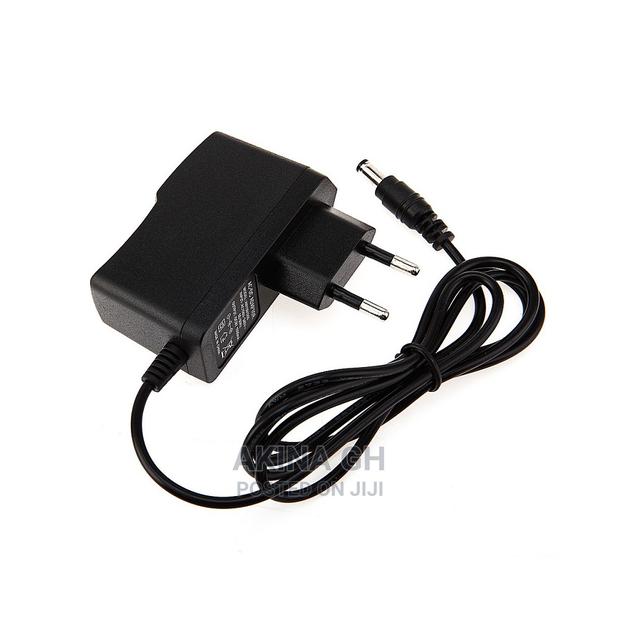 Power Adapter Ac/Dc 12V, 1A · Photo 4