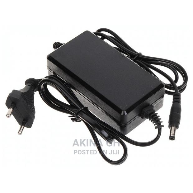 Power Adapter Ac/Dc 12V, 2A · Photo 2