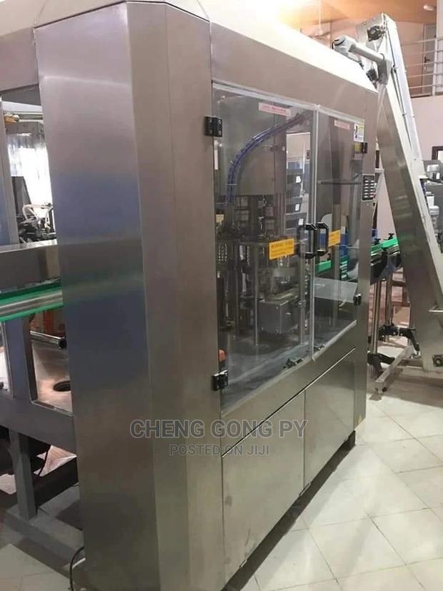 Semi Automatic 3-in-1 Bottle Machine · Photo 2