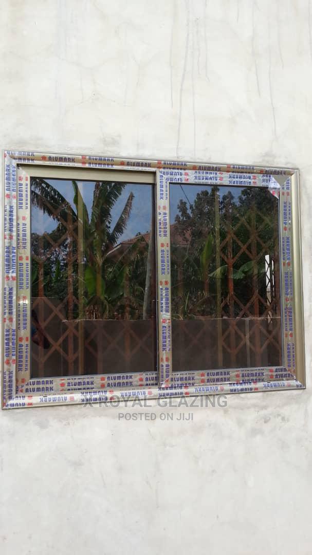 Italian Champagne Sliding Windows Well Installed