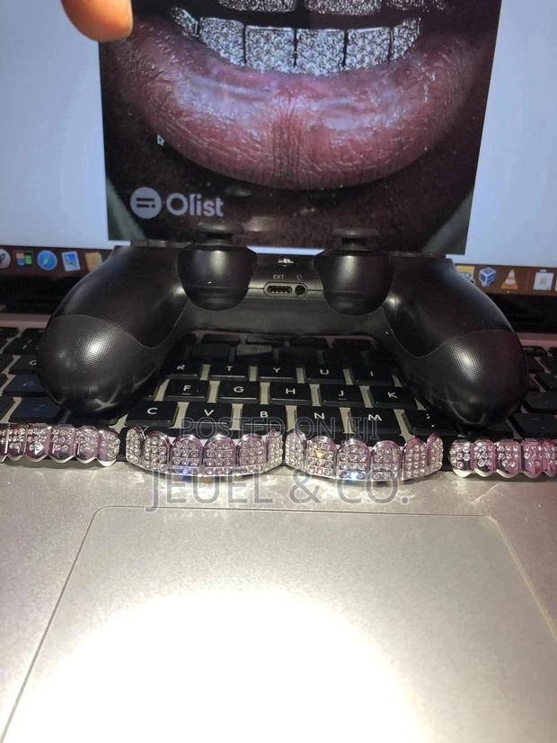 Original Iced Out Silver Grillz/Slugs photo 2
