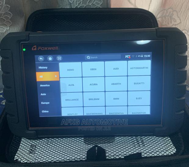 Foxwell NT809 OBD2 Automotive Scanner photo 2