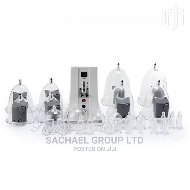 Therapy Massaging Cups and Machine · Photo 2