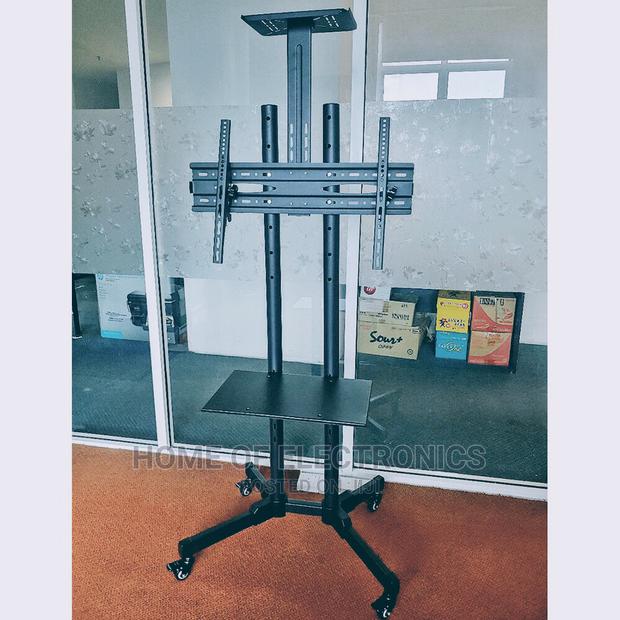 Affordable TV Stand With Wheels + DVD Glass(32-70 Inches) · Photo 1
