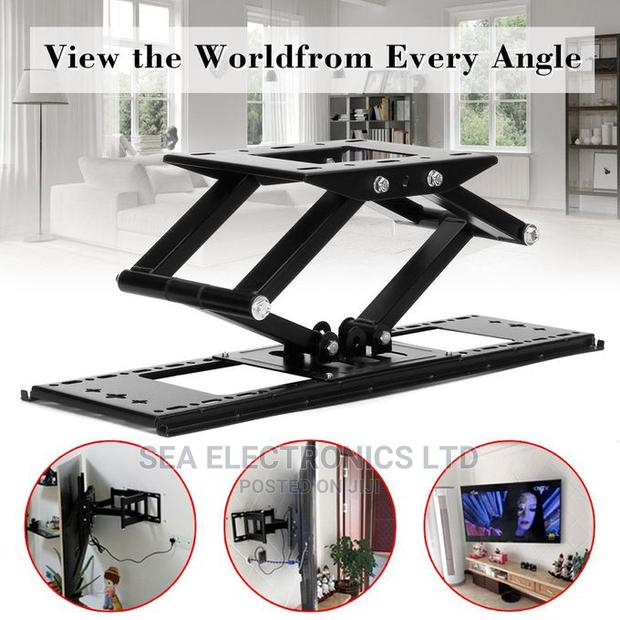 Newly Adjustable Double Arm 32-65 Inch Tv Wall Bracket · Photo 1