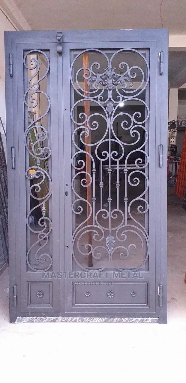 Quality Wrought Iron Security Door With Glass · Photo 2