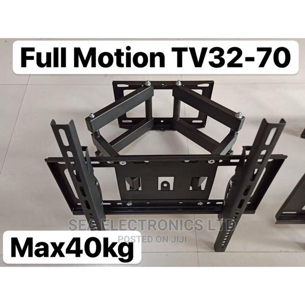 Adjustable Wall Mount for Led TVS 32”-70” · Photo 1