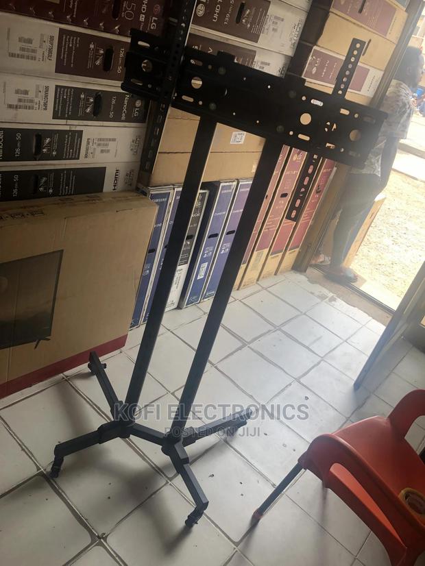 A Mobile TV Stand on Wheels for 32-75 Inch Flat/Curved Panel · Photo 2