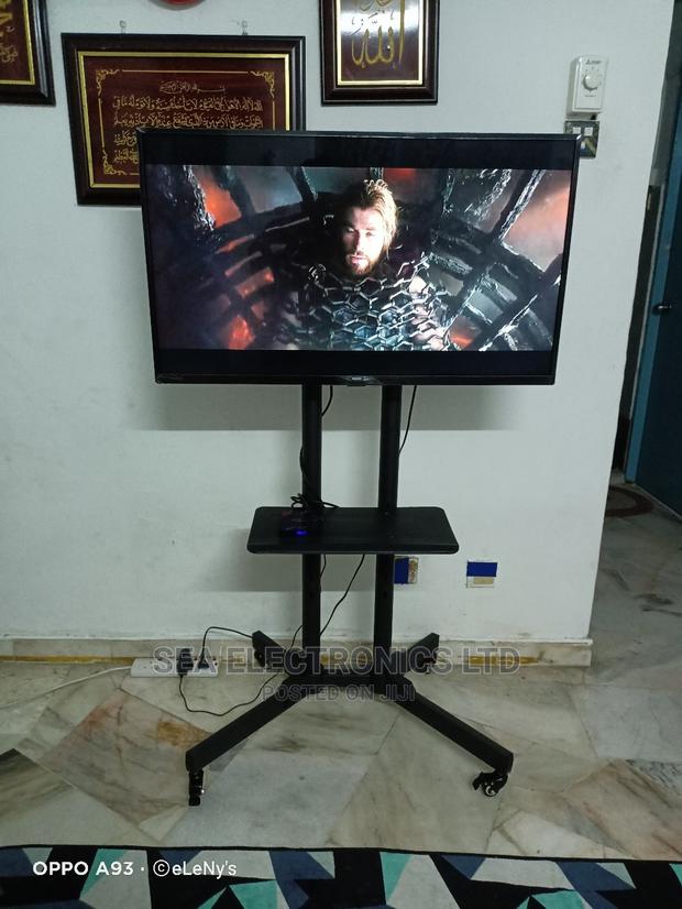 Highly Adjustable TV Cart Stand 32-65 Inch · Photo 2