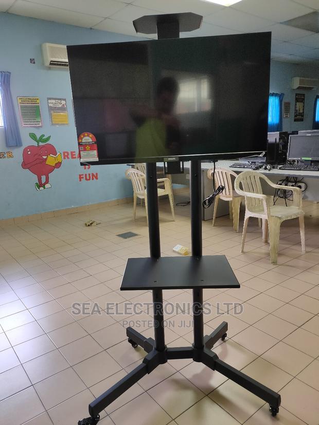 Genuine Tv Stand 32-65” With Wheels · Photo 2