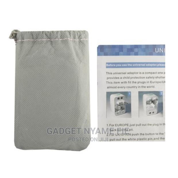 Universal World Charger Adapter Plug All in One Travel Ac Po · Photo 3