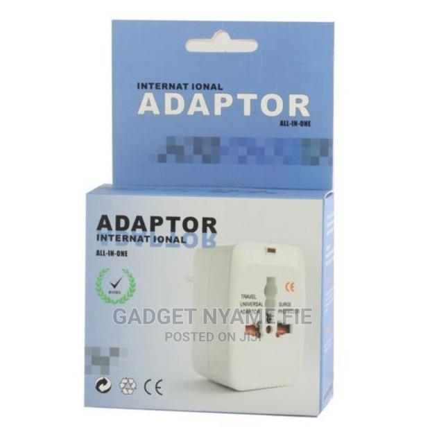 Universal World Charger Adapter Plug All in One Travel Ac Po · Photo 4