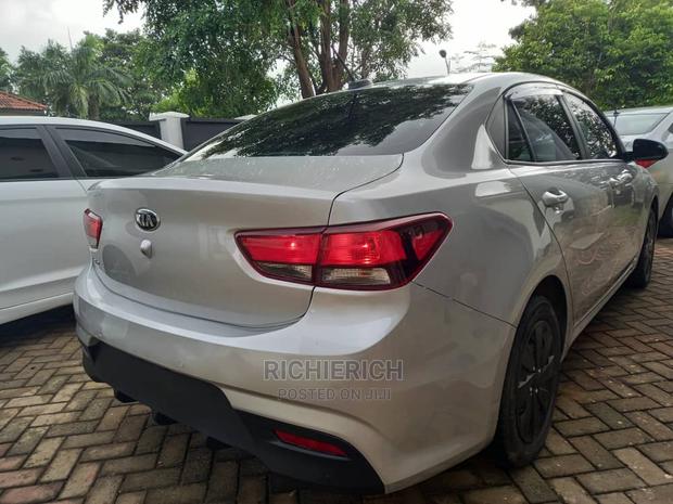 Silver Kia Rio Available for Rent photo 2