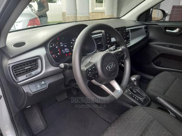 Silver Kia Rio Available for Rent photo 3
