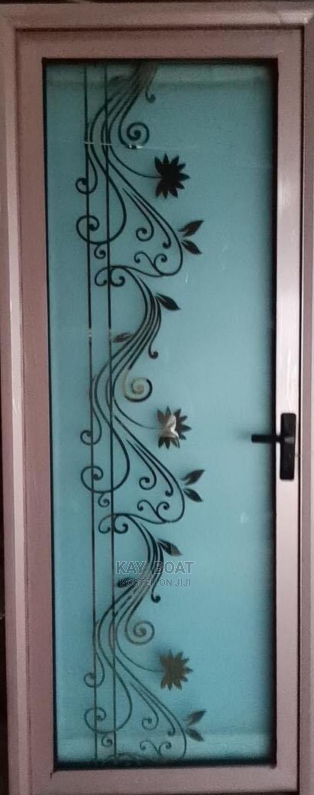 Elegant Bathroom Doors Available · Photo 2