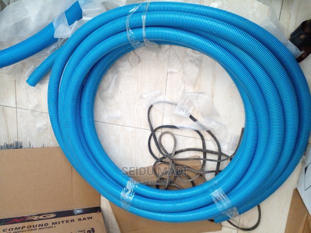 Outlet and Inlet Hose · Photo 3