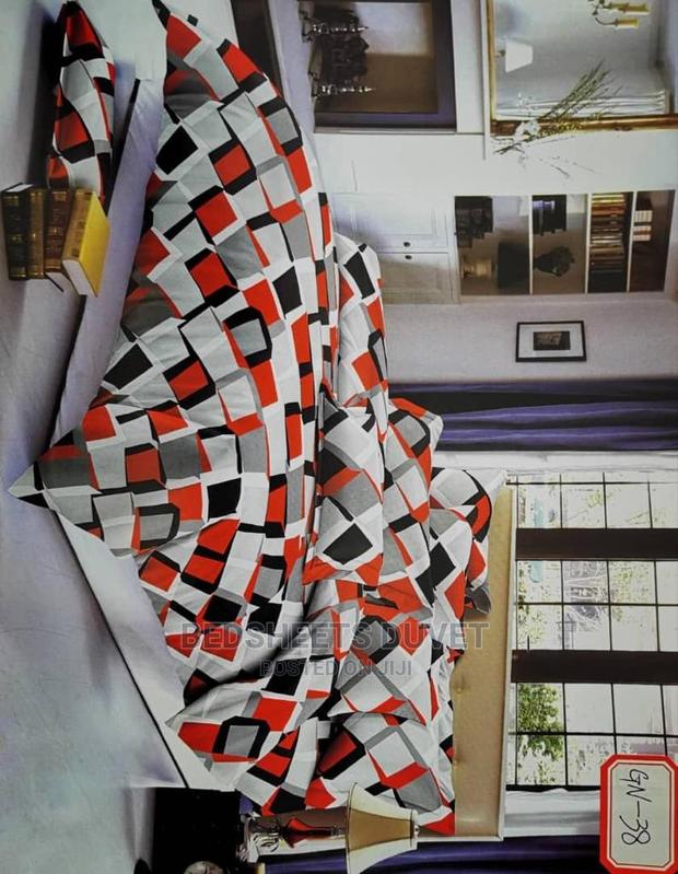 2 Cotton Sheets and 2 Pillow Cases · Photo 2