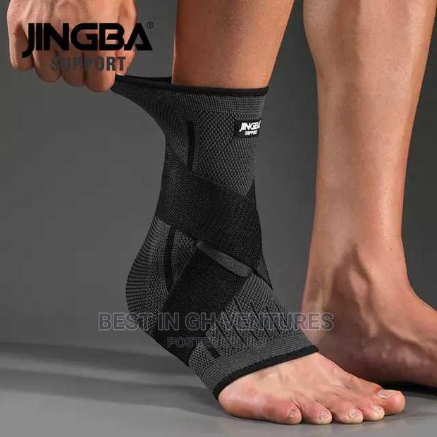 Ankle Brace With Strap Compression · Photo 4