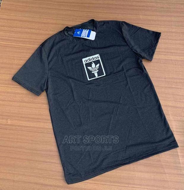 Adidas Tops · Photo 4