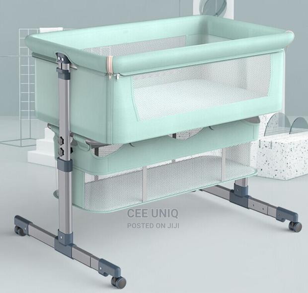 Bedside Bassinet With Net and Swing · Photo 3