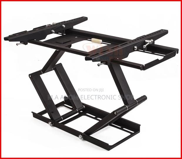Save More Space With Full Motion Adjustable Tv Mount 32”-75” · Photo 2