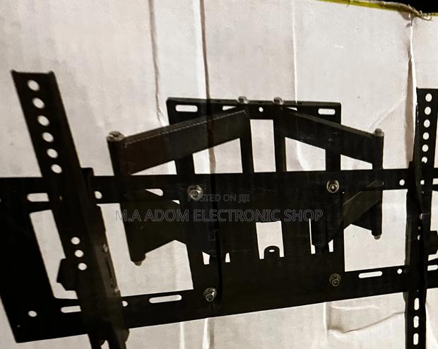 Very Easy Simple to Mount Flexible Wall Mount 32”-70” · Photo 2