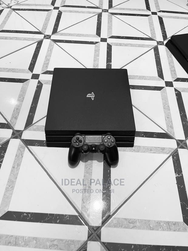 Black Ps4 Pro With 5 Games · Photo 4