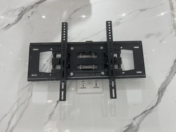 Wall Mount Suitable For Tv Between 32”-70” · Photo 2