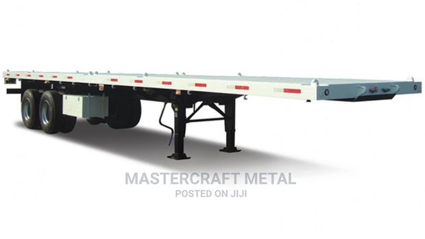 White Flatbed Semi Trailer · Photo 2
