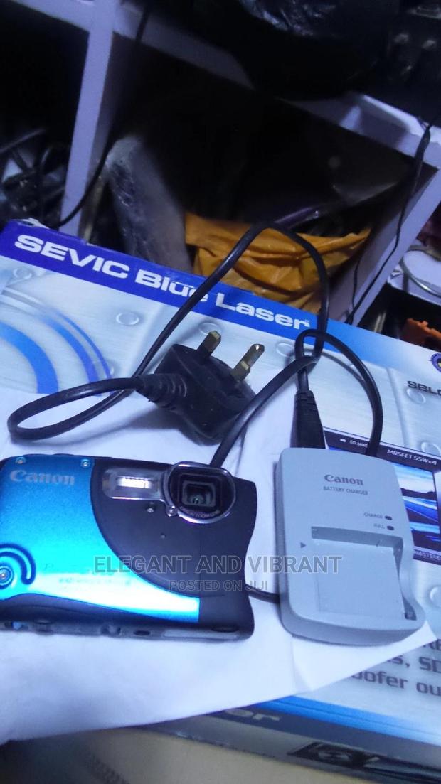 A Little Used Canon Waterproof Camera in Used Condition. photo 2