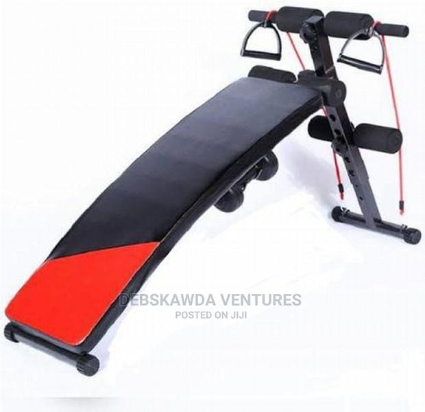 Stomach Bench With Dumbbells · Photo 2