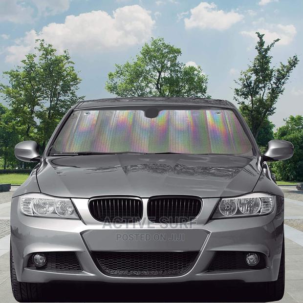 Vehicle Sunshield UV Protector. Keeps Interior Cool Always. photo 4