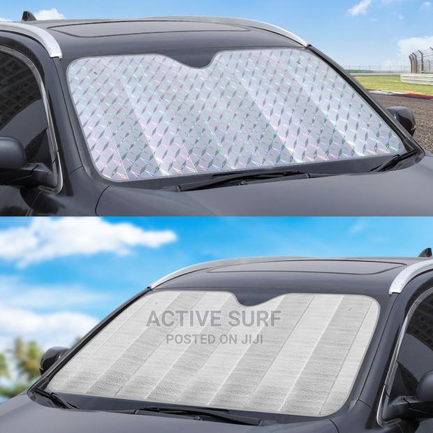 Vehicle Sunshield UV Protector. Keeps Interior Cool Always. photo 6