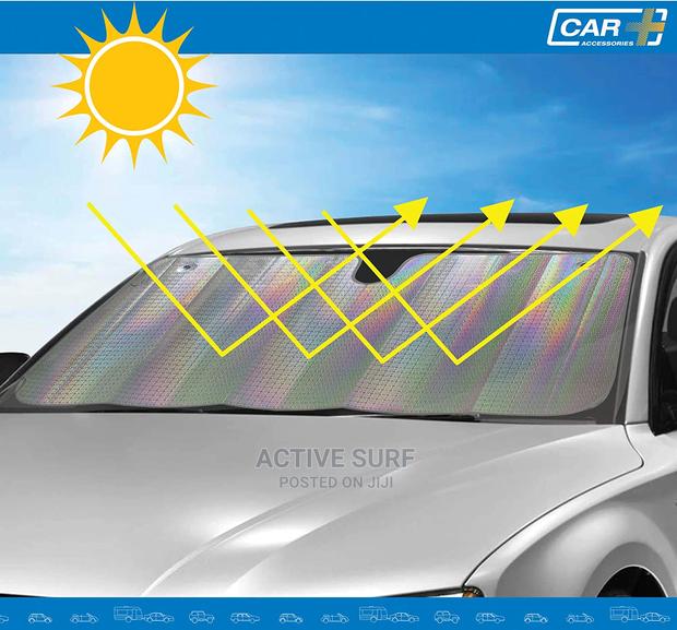 Vehicle Sunshield UV Protector. Keeps Interior Cool Always.