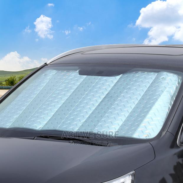 Vehicle Sunshield UV Protector. Keeps Interior Cool Always. photo 8
