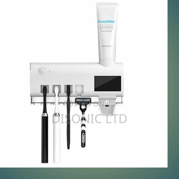 Solar Electric Sterilizing Brush Toothpaste Dispenzer · Photo 4