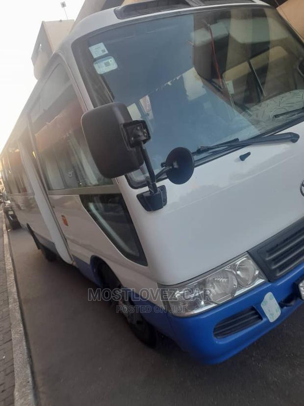 Rent a Car - Toyota Coasters Bus 30 Passengers Buses · Photo 4