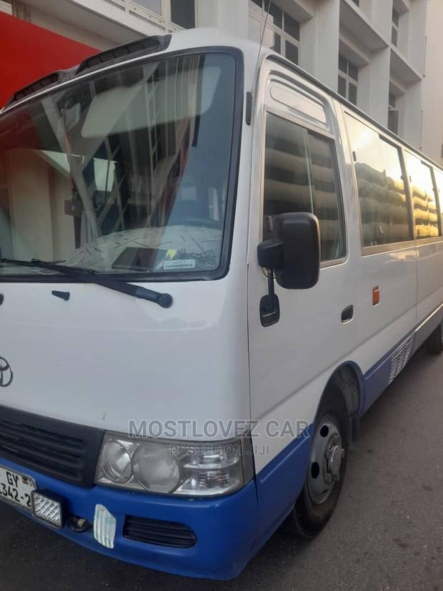 Rent a Car - Toyota Coasters Bus 30 Passengers Buses · Photo 3