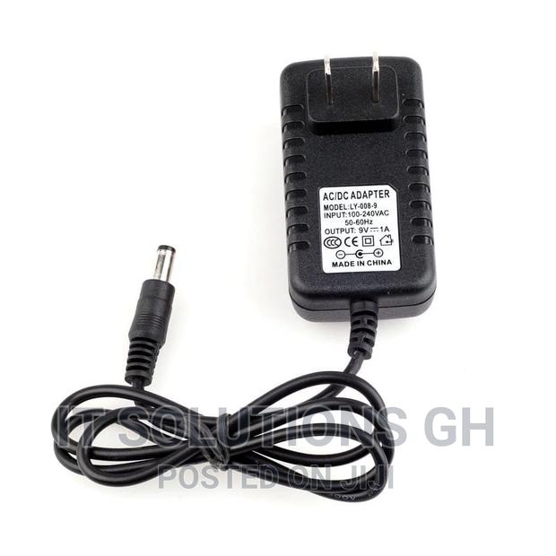 AC/DC 9V 1A Switching Power Supply Adapter · Photo 2