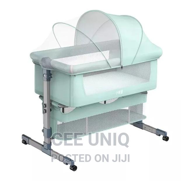 Bedside Bassinet With Net and Swing · Photo 2