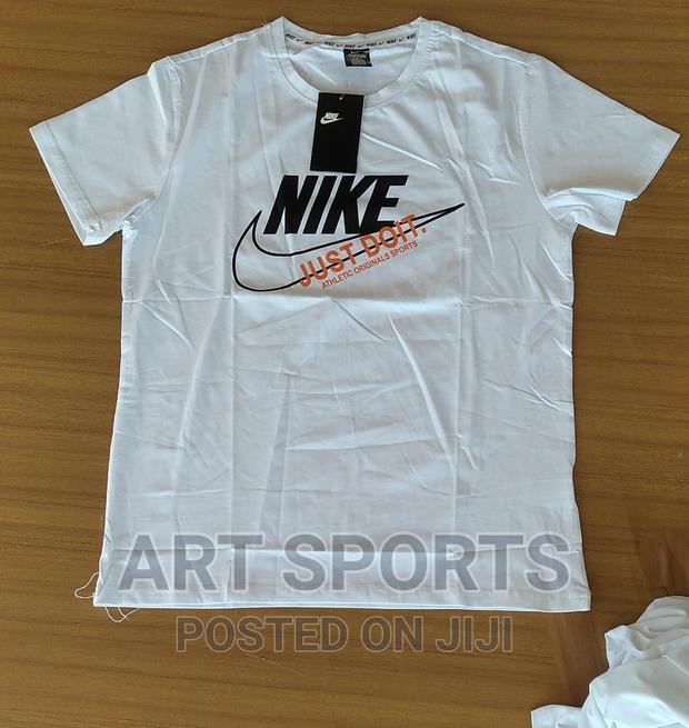 Nike Tops . · Photo 3
