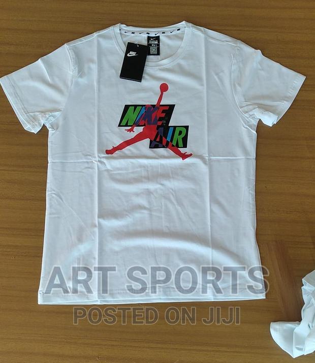 Nike Tops . · Photo 4