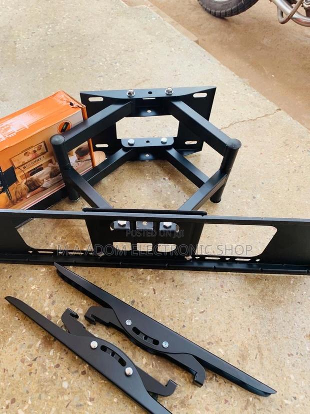 Newly in Stock Full Motion Adjustable Wall Mount(32”-70”). · Photo 2