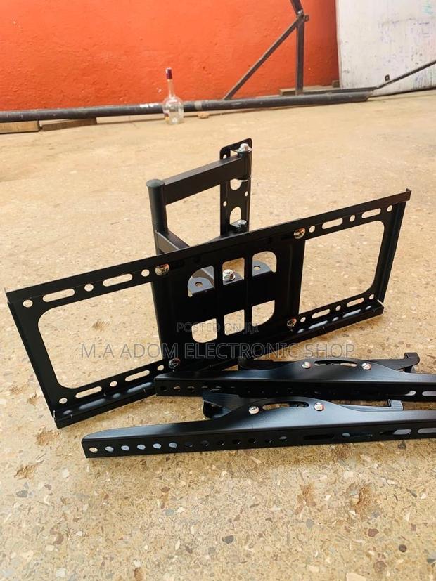Quality Adjustable Corner Wall Mount for 32-55” Tv · Photo 2