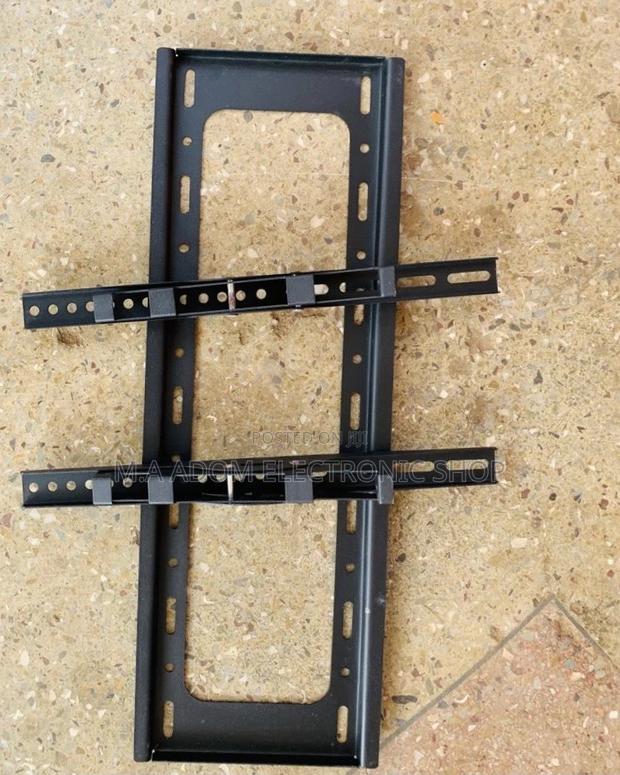 (32”-70”)Fresh in Box Full Motion Adjustable Wall Mount · Photo 2