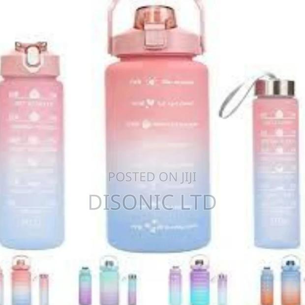 A Set of 3 School Children Drinking Water Bottles · Photo 4