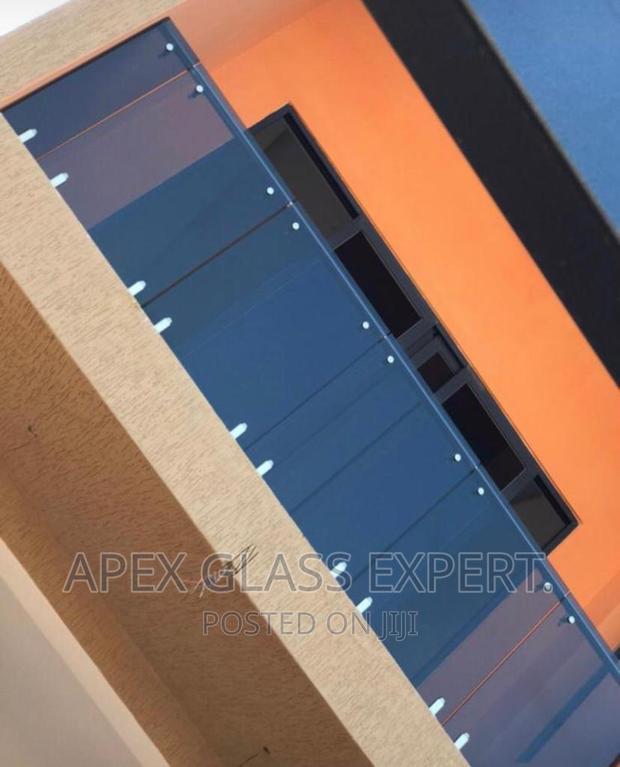 6+6mm Dark Glass Balcony Balustrade by Apex Glass Expert.